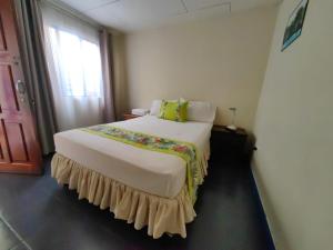 Cama o camas de una habitación en Hotel Casa Tago