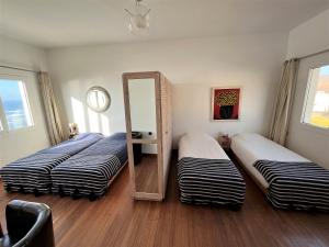 Cama ou camas em um quarto em logis la marine