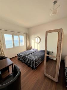 Cama ou camas em um quarto em logis la marine