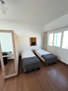 Cama ou camas em um quarto em logis la marine