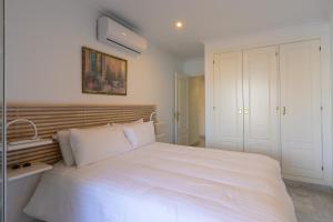 Posteľ alebo postele v izbe v ubytovaní Great views, large terrace & walking distance