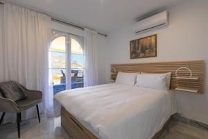 Posteľ alebo postele v izbe v ubytovaní Great views, large terrace & walking distance