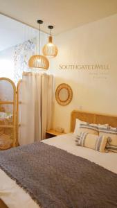 Postel nebo postele na pokoji v ubytování 南門小宅 Southgate Dwell
