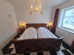 Ein Bett oder Betten in einem Zimmer der Unterkunft Überfahrt vor Sylt