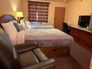 Postel nebo postele na pokoji v ubytování Frazier View Motel