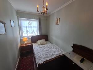 Ein Bett oder Betten in einem Zimmer der Unterkunft Überfahrt vor Sylt