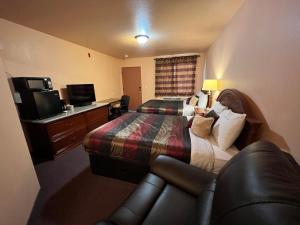Postel nebo postele na pokoji v ubytování Frazier View Motel