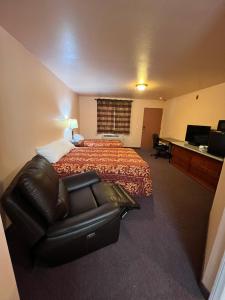 Postel nebo postele na pokoji v ubytování Frazier View Motel