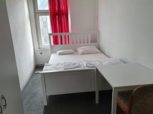 Ein Bett oder Betten in einem Zimmer der Unterkunft Märkischer Hof Hotel
