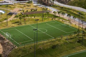 an overhead view of a tennis court in a park at Troia Residence by The Editory - Apartamentos Marina in Troia
