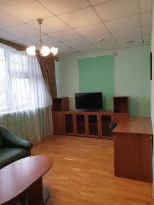 TV a/nebo společenská místnost v ubytování Hotel Obolon-Arena