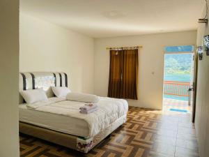 Vandu's View Guest house & Restaurant客房内的一张或多张床位