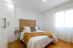 Posteľ alebo postele v izbe v ubytovaní PISO NUEVO EN TRIANA