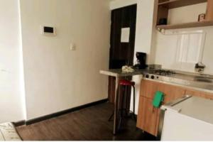 Una cocina o zona de cocina en Apartamento Independiente Chapinero Alto 303