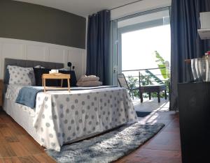 Postel nebo postele na pokoji v ubytování Suite com piscina e jacuzzi + 15 fotografií