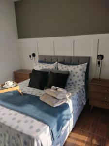 Letto o letti in una camera di Suite com piscina e jacuzzi