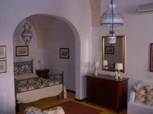 Postel nebo postele na pokoji v ubytování B&B Archidamo