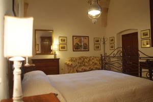 Postel nebo postele na pokoji v ubytování B&B Archidamo
