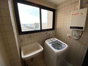 Koupelna v ubytování Flat Residence Moema c/ cozinha e lavadora UH104