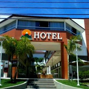 a hotel with a sign on the front of it at Hotel Terras da Finlândia in Penedo