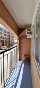 a balcony with a bench and a window at Mikaela's Crib- 1 Bedroom flat @ Arezzo Place Condominium in Davao City