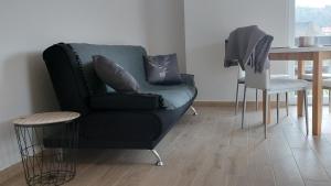 Ein Sitzbereich in der Unterkunft APARTAMENTY MONTANIA WISŁA
