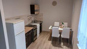 Küche/Küchenzeile in der Unterkunft APARTAMENTY MONTANIA WISŁA