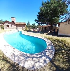 Πισίνα στο ή κοντά στο Cabañas De Cara al Sol