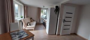 Ein Sitzbereich in der Unterkunft APARTAMENTY MONTANIA WISŁA