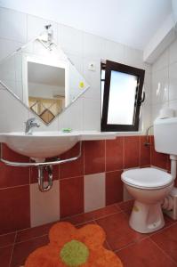 Koupelna v ubytování Apartments by the sea Vela Luka, Korcula - 9243