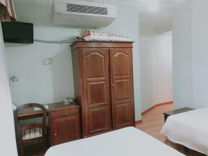 Posteľ alebo postele v izbe v ubytovaní Hotel Chipén