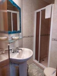 Kúpeľňa v ubytovaní Hotel Chipén