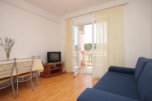Μια τηλεόραση ή/και κέντρο ψυχαγωγίας στο Apartments and rooms by the sea Cove Soline, Dugi otok - 448