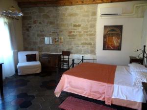 Postel nebo postele na pokoji v ubytování Locanda dell'Istrice