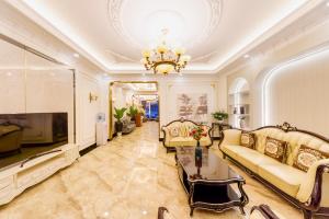 TV a/nebo společenská místnost v ubytování Wisteria Hotel