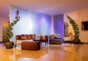 Χώρος καθιστικού στο Blanco Apartment Hotel
