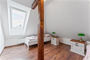 Posteľ alebo postele v izbe v ubytovaní Villa Libosad