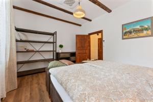 Posteľ alebo postele v izbe v ubytovaní Villa Libosad