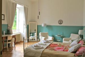 Säng eller sängar i ett rum på Bed & Blessing / Casa Borgo