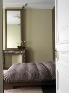 Llit o llits en una habitació de B&B Dusk till dawn