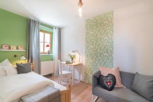 Postel nebo postele na pokoji v ubytování Roomerie