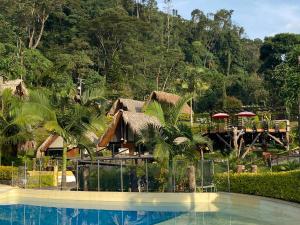 Bazén v ubytování Rancho Ecoturistico el Faro nebo v jeho okolí