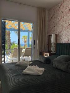 Postel nebo postele na pokoji v ubytování Timeless Cyprus