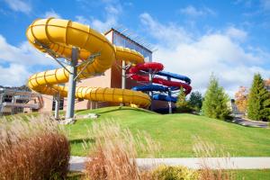 a water slide in front of a building at Split Rock Resort in Lake Harmony
