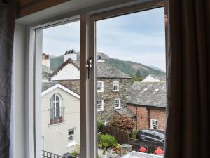 a window with a view of a city at 6 Twentyman Court in Keswick