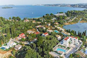 an aerial view of the resort and the water at Hidden Cove Corfu in Kontokali
