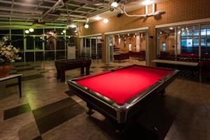 a pool table in the middle of a room at Berion Reosrt in Pyeongchang