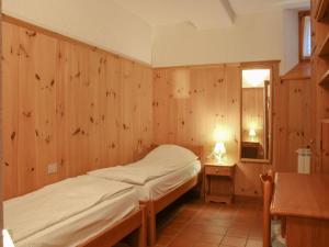 Posteľ alebo postele v izbe v ubytovaní Carlo B Garten Ferienwohnung EG