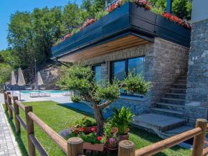 Zahrada ubytování Dascio Paradise Ferienwohnung mit Dachterrasse am See