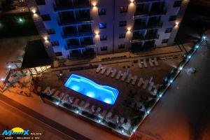 an overhead view of a stage in a building at night at Monix Palace Zlatibor in Zlatibor